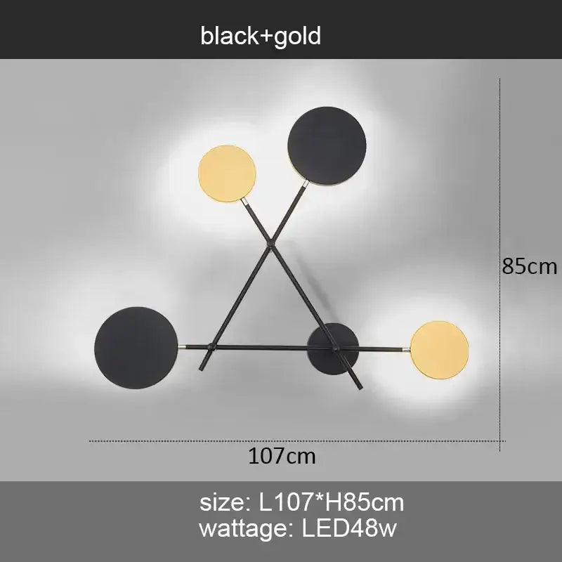 Modern black and gold wall sconce with a geometric tripod structure by decorbites adjustable rotating led light