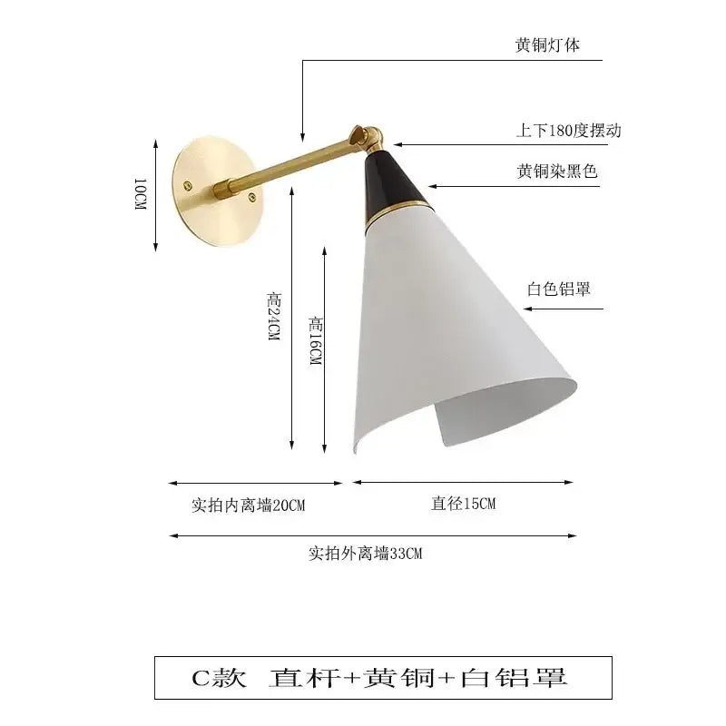 A modern black and gold adjustable wall lamp with brass arm and blackened brass shade by decorbites athena black