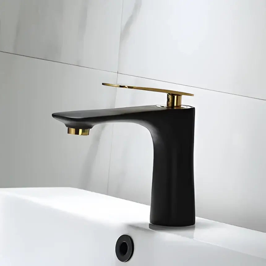 Modern black and gold basin faucet with a matte finish featuring an elegant design for bathroom sink mixer tap decorbites black