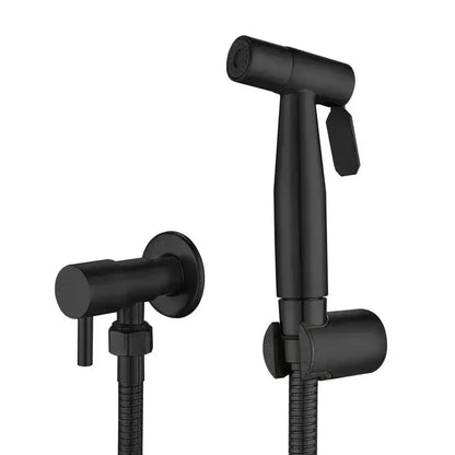 Modern black and gold bidet sprayer set with black matte finish nozzle and flexible hose for bathroom use