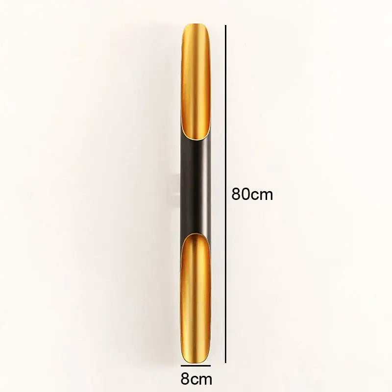Modern black and gold blade pendant light with sleek metallic finish and polished golden sections by decorbites coltrane pendant