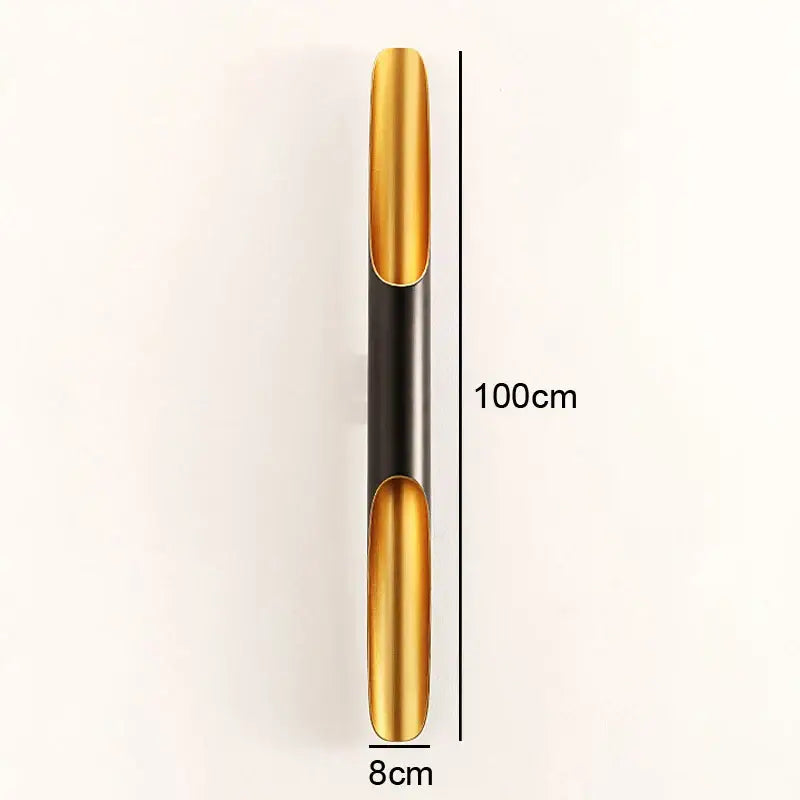 A sleek 100cm tall modern black and gold pendant light with polished and matte metal sections for dining room decorbites coltrane pendant light