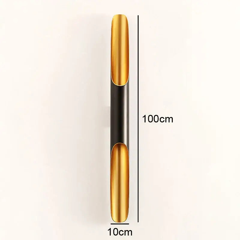 Modern black and gold blade pendant light with polished gold and matte black metal for dining room decorbites coltrane pendant
