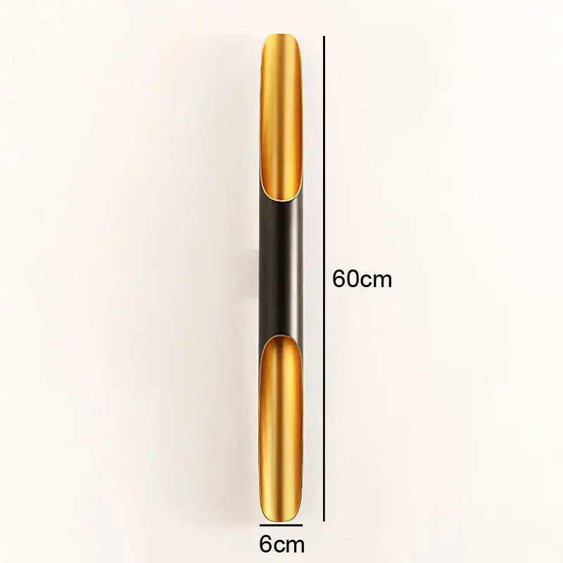 A sleek 60cm tall modern pendant light with polished gold and matte black metal for dining room decorbites coltrane pendant
