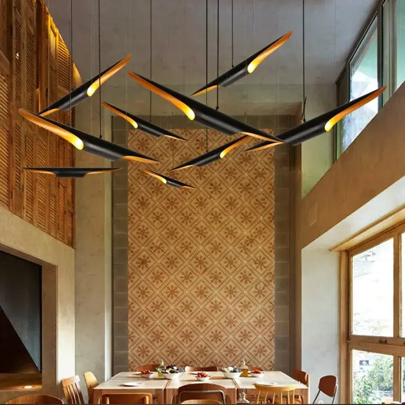 Modern black and gold decorbites coltrane pendant light with sleek blade design for dining room decor and pendant lighting