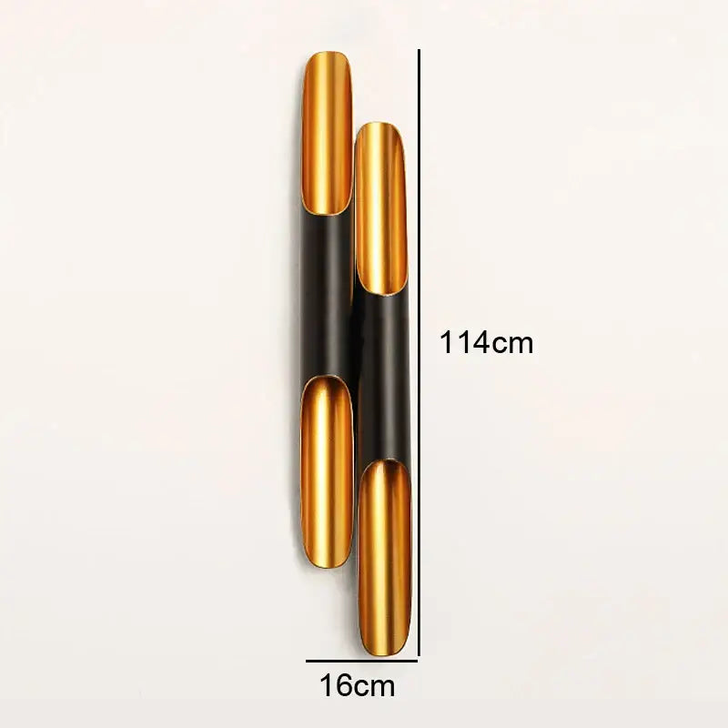 Modern black and gold blade pendant light with sleek gold and black cylindrical sconce design for dining room decorbites coltrane pendant