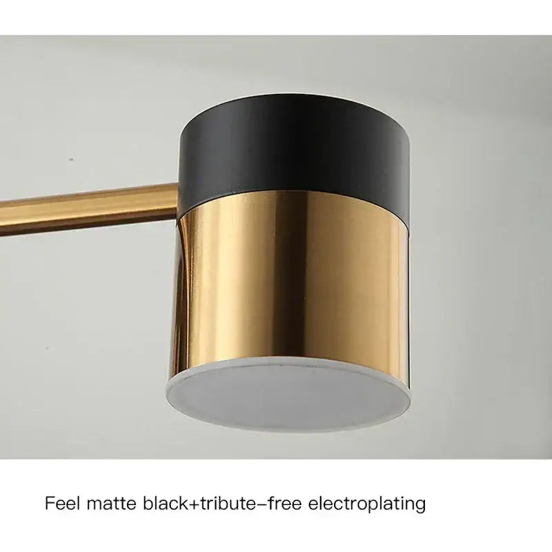 Modern black and gold branch led chandelier with a matte black top and polished gold lower section for living room decor