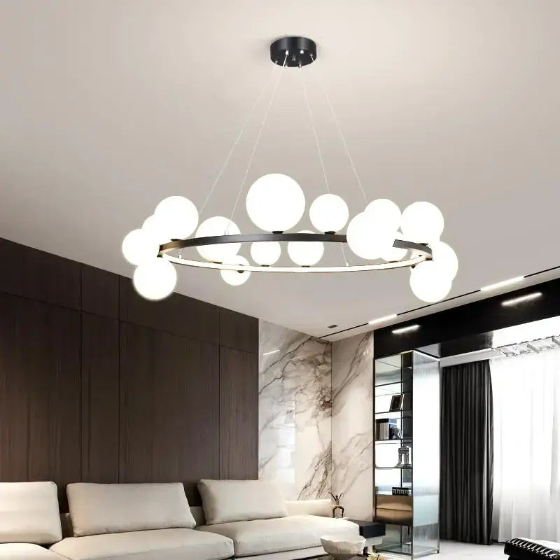 Modern black and gold branching bubbles chandelier with frosted white glass globes for dining room decorbites lighting