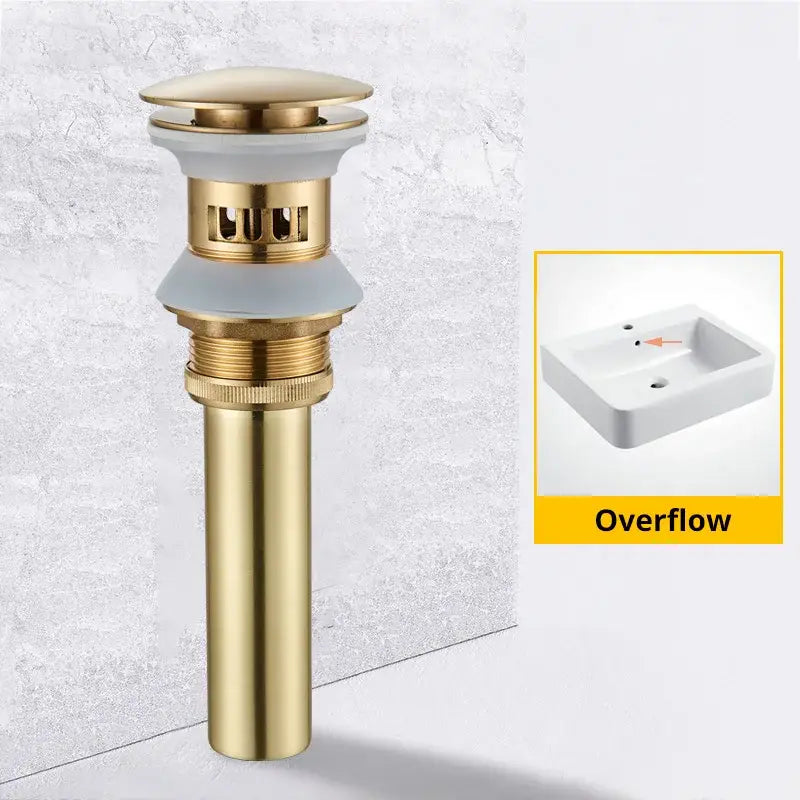 Modern black and gold brass basin sink pop up drain with gold toned metal and white ceramic overflow cover decorative base
