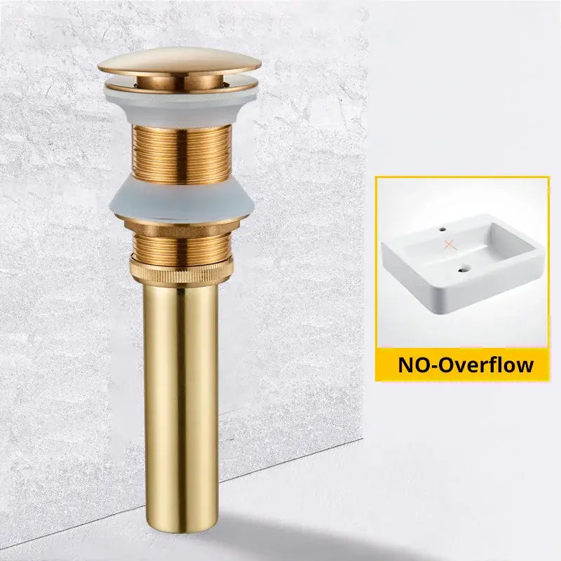 Gold-toned brass basin sink pop up drain with a sleek cylindrical body and ribbed texture for modern bathroom decorbites brass basin