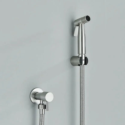 Modern black and gold brass bidet faucet with a chrome handheld showerhead featuring black grip and flexible hose decorbites brass bidet