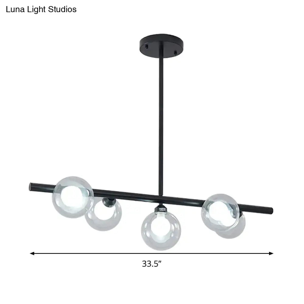 Modern black ceiling light with four bubble clear glass globes for clear glass island dining room illumination