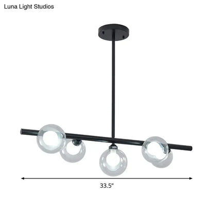Modern black ceiling light with four bubble clear glass globes for clear glass island dining room illumination