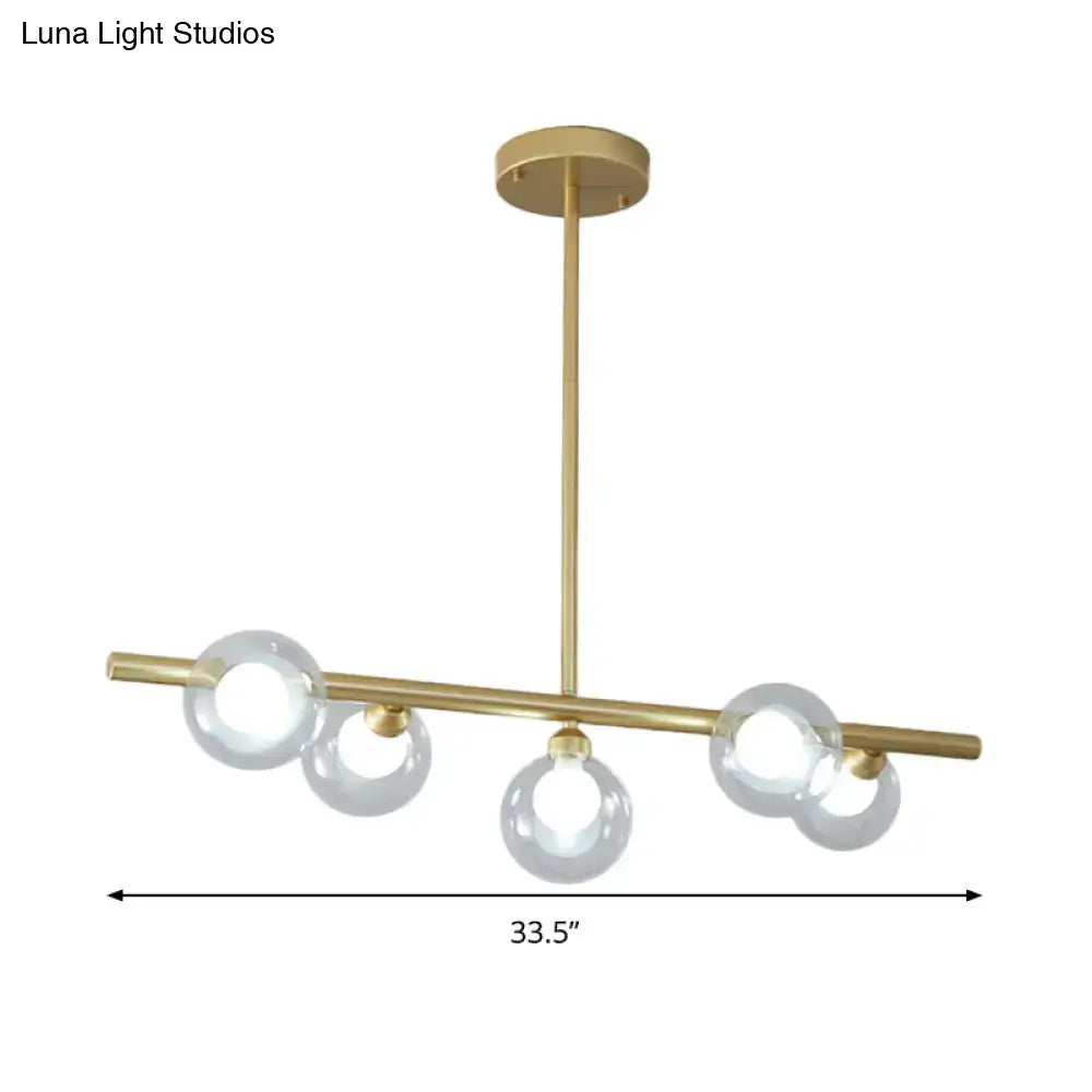 Modern black and gold ceiling light with five bubble clear glass globes for dining room clear glass island use