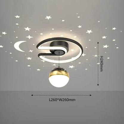 Modern black and gold celestial led ceiling lamp with curved ring and spherical pendant casting star-shaped decals