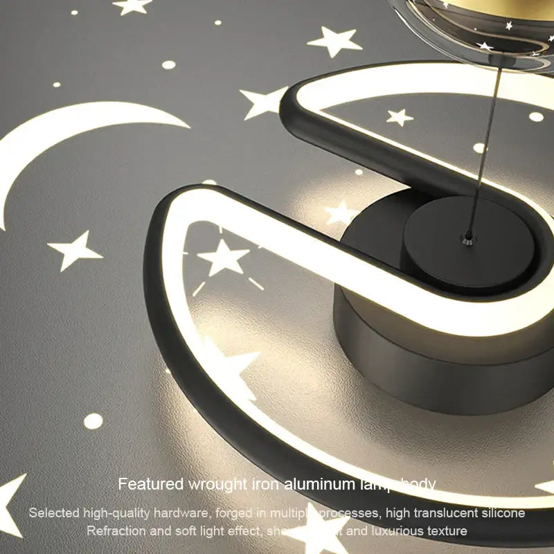 Modern black and gold celestial led ceiling lamp with crescent moon shape and sleek wrought iron aluminum body light strip