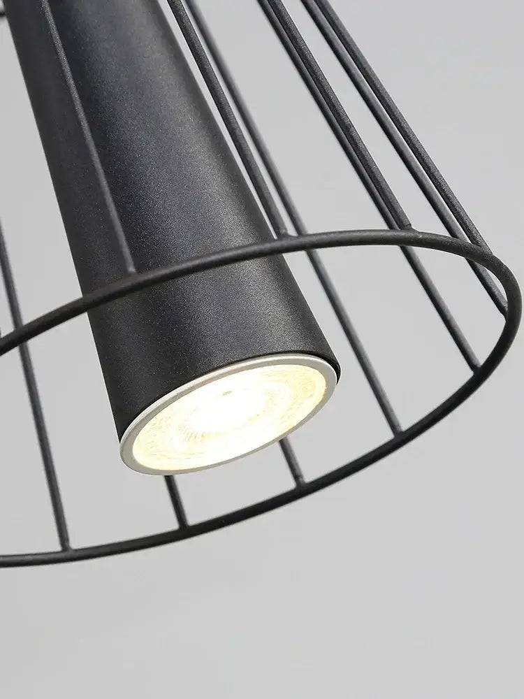 Modern black and gold circular iron pendant light with matte finish and wire cage design for dining room decorbites iron art room pendant light