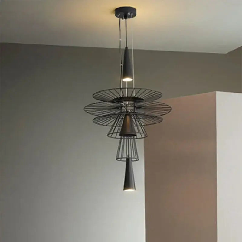 Modern black and gold circular iron pendant light with tiered radial wireframe and conical light fixtures for dining room decorbites iron art room pendant light