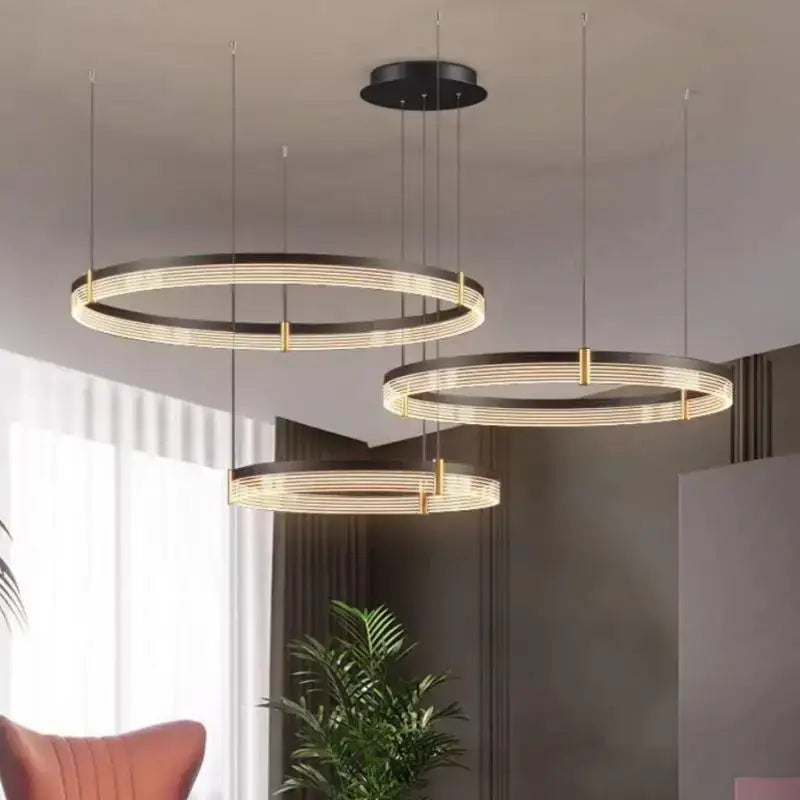 Modern black and gold pendant light with concentric led rings in black acrylic for stylish living room decorbites black acrylic led