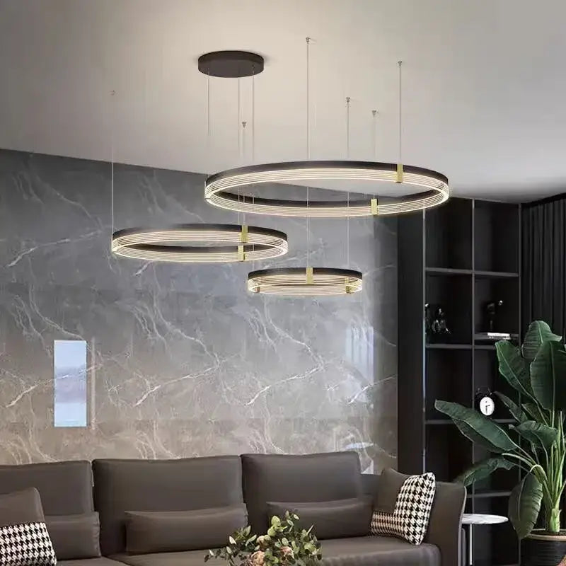 Modern black and gold circular pendant light with decorbites black acrylic led rings for living room illumination