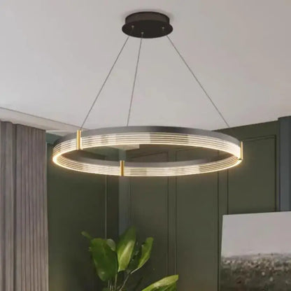 Modern black and gold circular pendant light with sleek metallic frame and warm led lighting perfect for living room decorbites black acrylic led