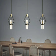 Three modern black and gold pendant lights with clear glass e27 bulbs perfect for dining room decorbites clear glass lighting