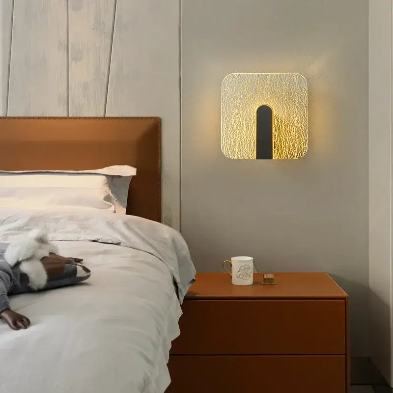 Modern black and gold crackled glass led wall lamp with textured golden-yellow glass and sleek black accent for bedroom