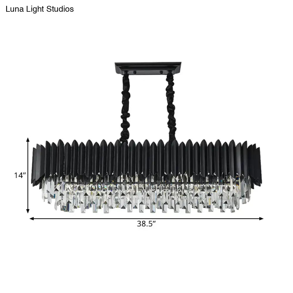 Modern black and clear crystal chandelier with gold accents and elongated rectangular design for dining room lighting