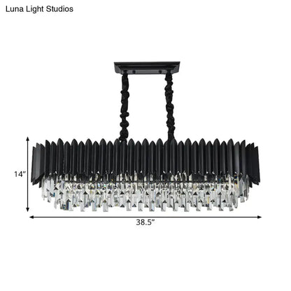 Modern black and clear crystal chandelier with gold accents and elongated rectangular design for dining room lighting