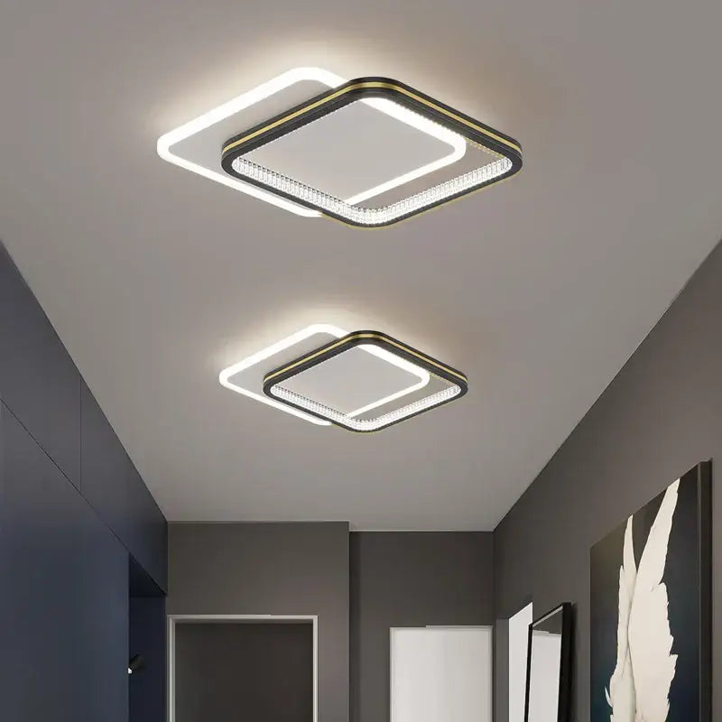 Modern black and gold decorbites crystal led ceiling lights with sleek frame and glowing edge lights for entrance hallways