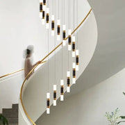 Modern black and gold crystal led chandelier staircase pendant light by decorbites featuring cascading cylindrical design