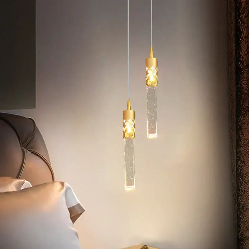 Two elegant black and gold crystal led pendant lamps with warm glowing illumination for dining room decorbites crystal led