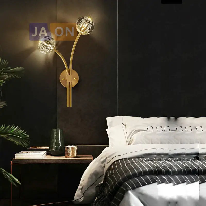 Modern black and gold crystal led wall sconce with gold-toned frame and two crystal globe shades for bedroom decorbites crystal led wall