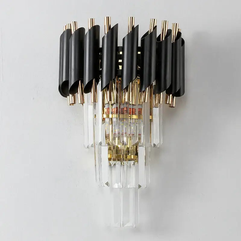 Modern black and gold crystal luxury wall lamp with curved metallic tubes and cascading crystal prisms for bedroom decorbites crystal luxury wall