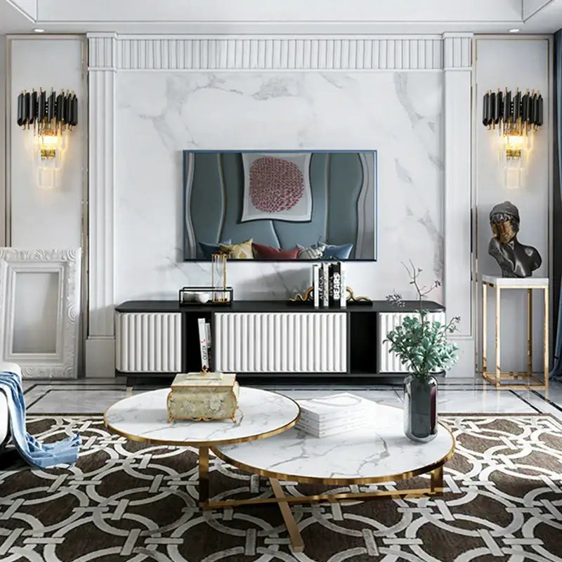 Modern black and gold crystal luxury wall lamp shown above gold-framed round marble coffee tables with greenery decorbites crystal luxury wall