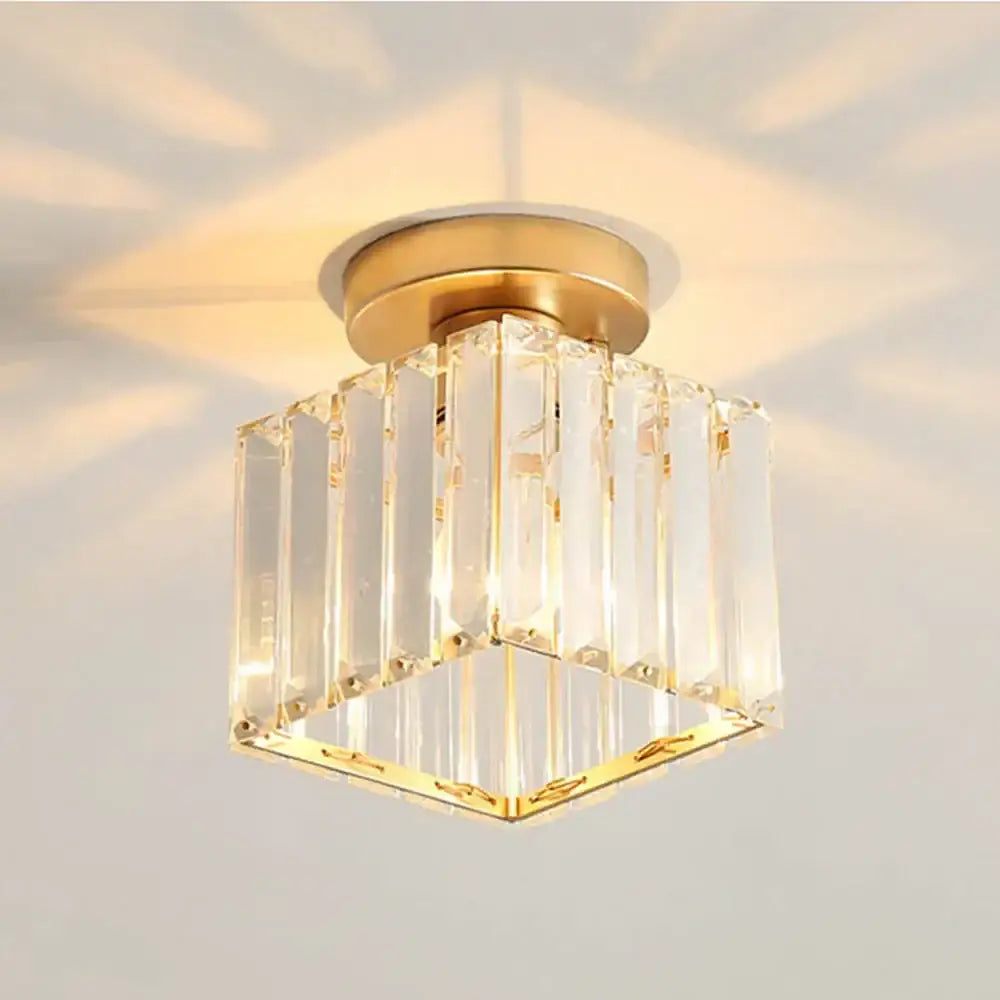 Modern black and gold ceiling light with crystal pendant ceiling featuring clear vertical glass prisms for bedroom decorbites decor