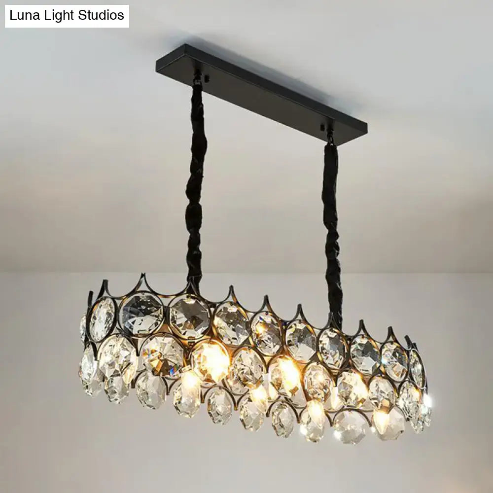 Modern black wrought iron pendant lighting fixture with crystal prism shade and twisted chains for dining room