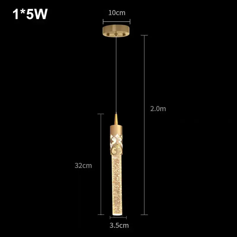 Gold-toned crystal rod pendant light with intricate cut-out patterns and textured glass for modern dining rooms