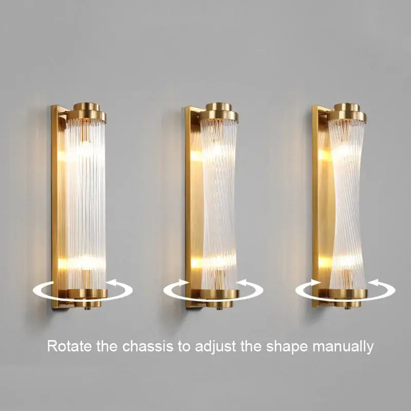 Modern black and gold crystal wall lamp with a gold-finished adjustable cylindrical glass crystal wall sconce for bedroom