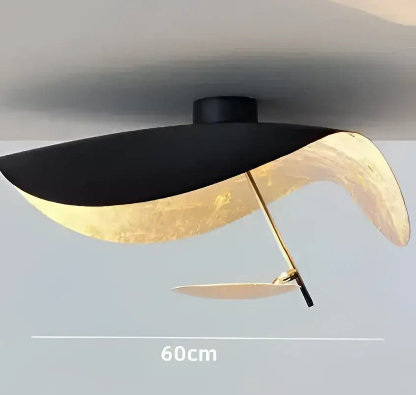Modern black and gold curved manta pendant lamp with sleek design for dining room decorbites lederam manta lighting