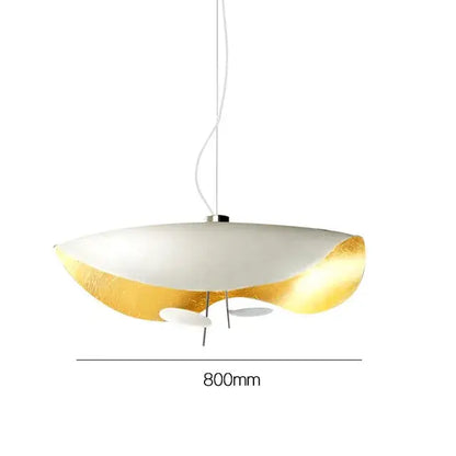 Modern black and gold curved pendant light with sleek white and gold leaf design for dining room decorbites lederam manta