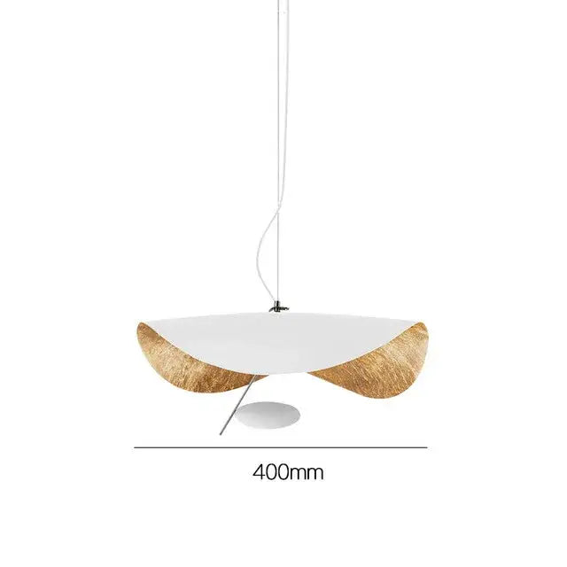 Modern black and gold curved pendant light with white shade and gold-leaf edges in dining room decorbites lederam manta