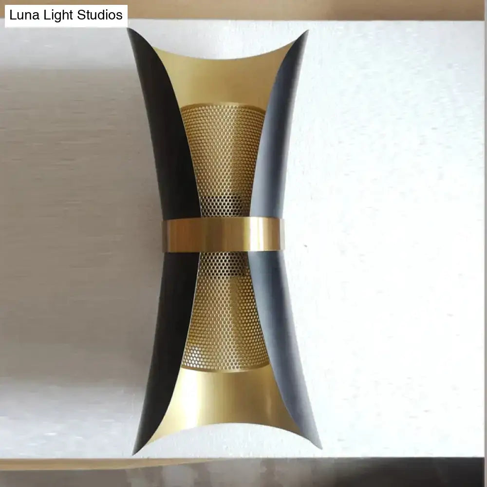 Modern black and gold curved wall lamp with sleek metallic finish designed for bedroom lighting