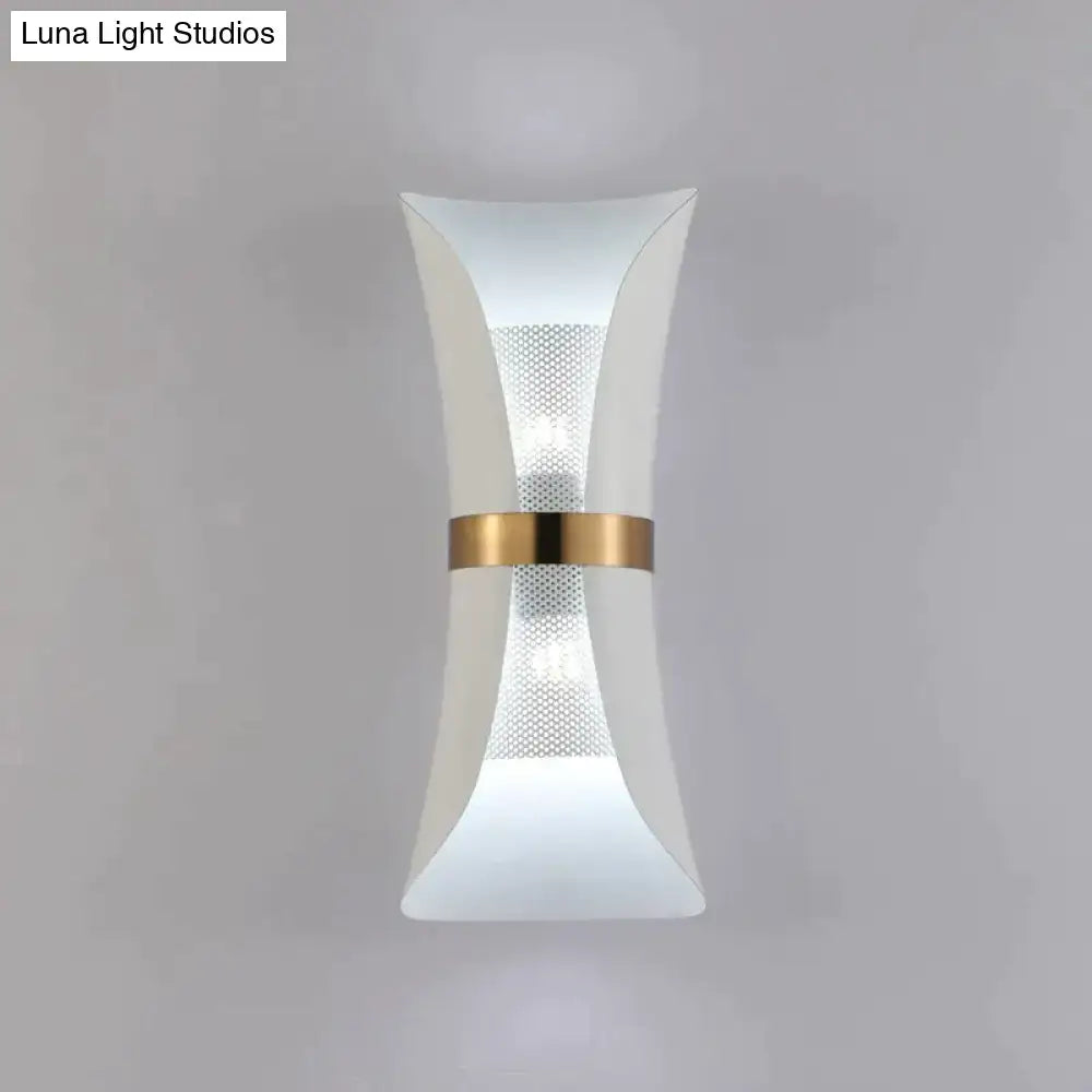 Modern white acrylic wall lamp with gold-toned metallic band and perforated mesh detail for bedroom use
