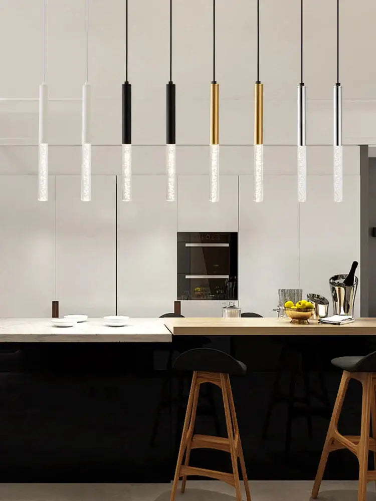 Modern black and gold cylinder pendant lights with glass shades and metal accents for kitchen island decorbites black cylinder pendant