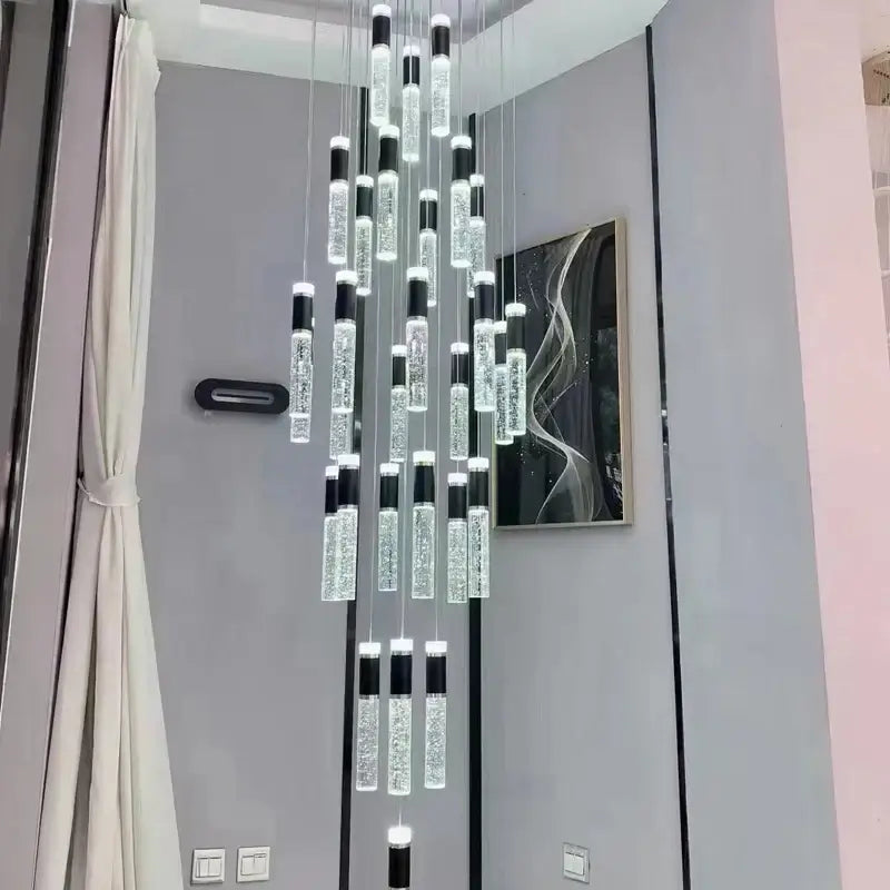 Modern black and gold cylindrical crystal chandelier with cascading glass tubes for elegant living room decorbites cylindrical crystal lighting