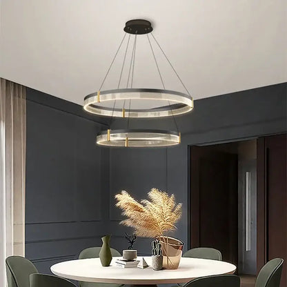 Modern black and gold decorbites circle chandelier with sleek double-ring led design for dining room lighting