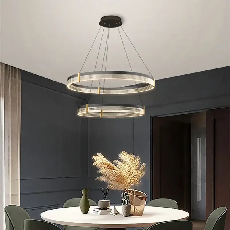Modern black and gold decorbites circle chandelier with sleek double-ring led design for dining room lighting