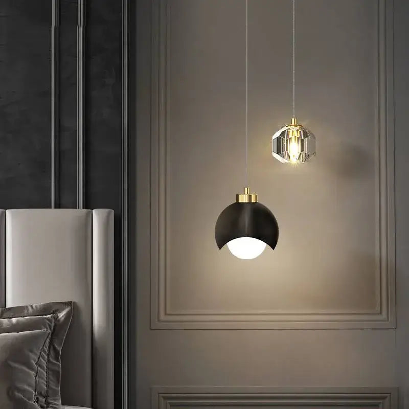 Modern black and gold decorbites crystal round chandelier featuring a black matte pendant with gold metal and clear crystals