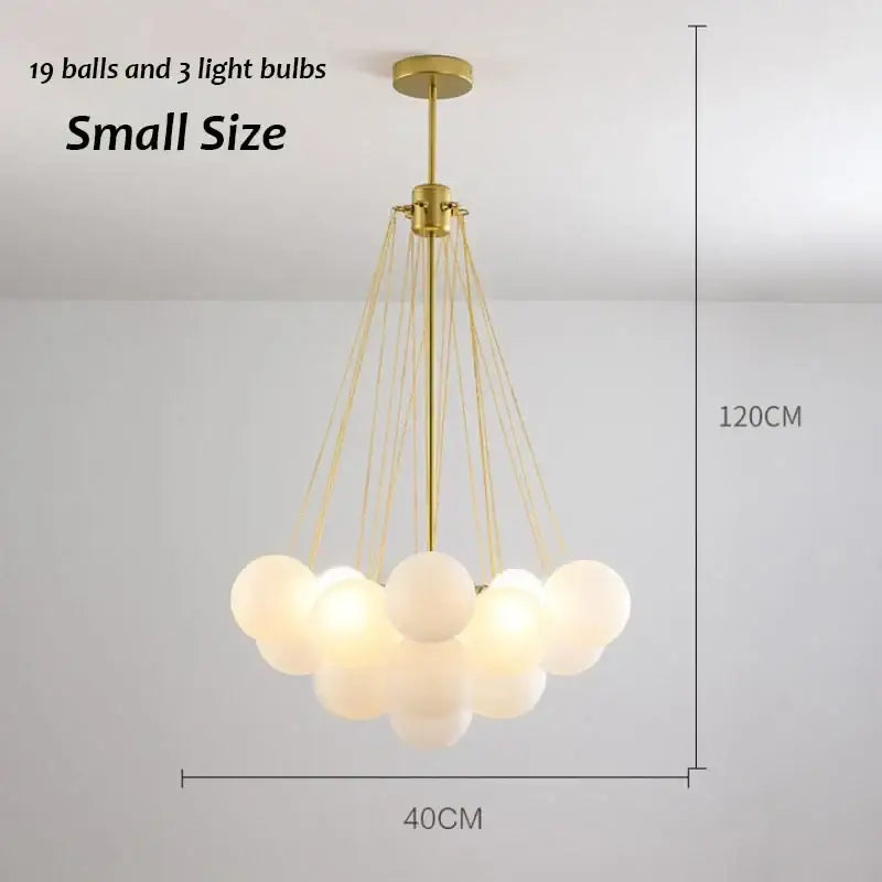 Gold-finished decorbites glass chandelier with 19 frosted frosted glass orbs for modern dining room lighting